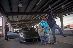 photo of family with ferrari at xtreme xperience