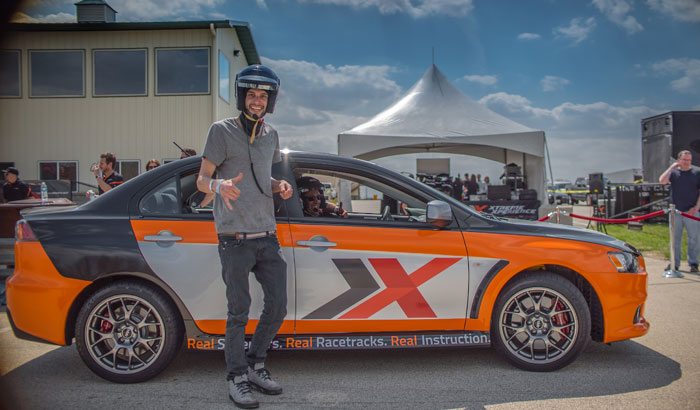 Ride along with a pro driver on a racetrack with Xtreme Xperience