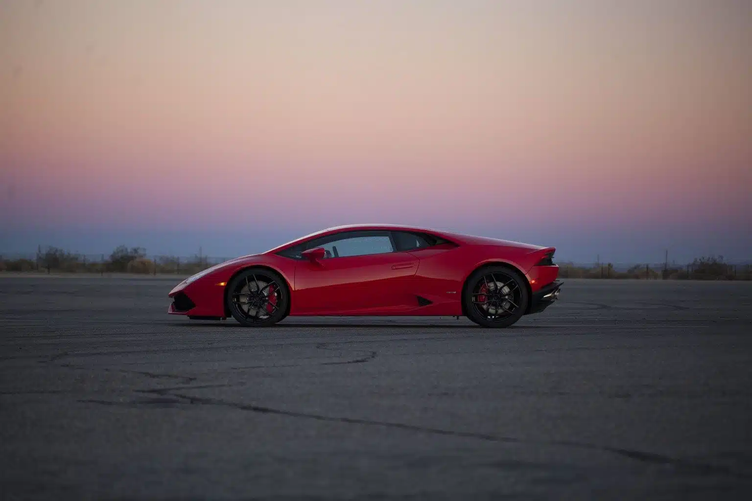 Photo of Xtreme Xperience Exotic supercar lamborghini at sunset on track