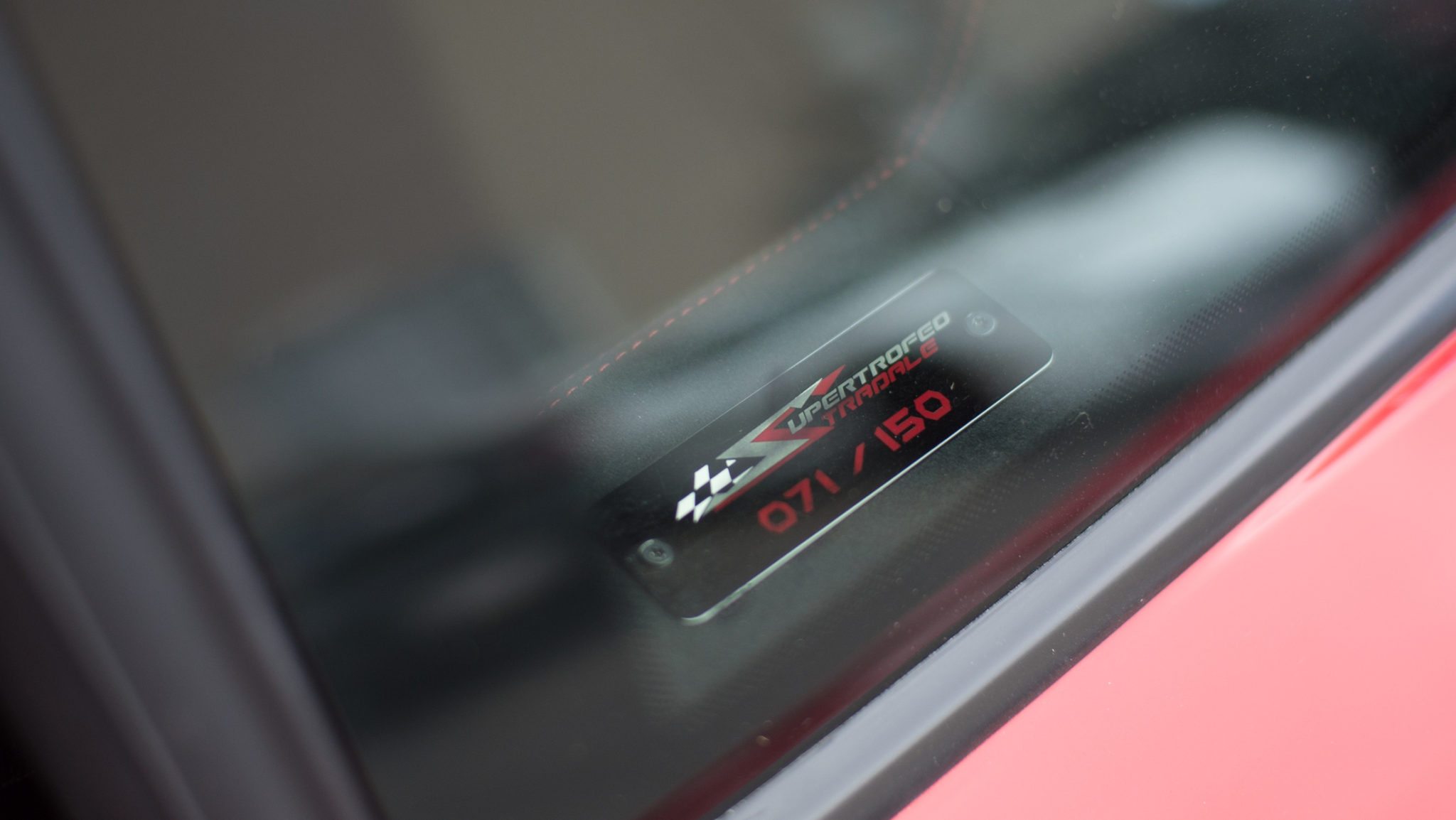 Image of xtreme xperience super trofeo stradale 71/150 badge interior