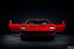 photos of red lamborghini miura with doors open taken by Jeremy Cliff
