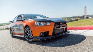 The Xtreme Xperience Mitsubishi Evo apexes turn one at Circuit of the Americas