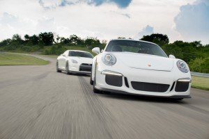 The Porsche 911 GT3 and Nissan GT-R on track together for a photo shoot