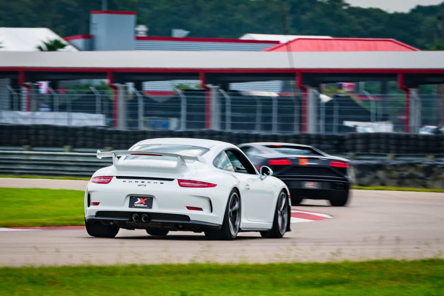 image of xtreme xperience porsche gt3 and lamborghini lp 560-4 at NOLA motorsports park my life at speed