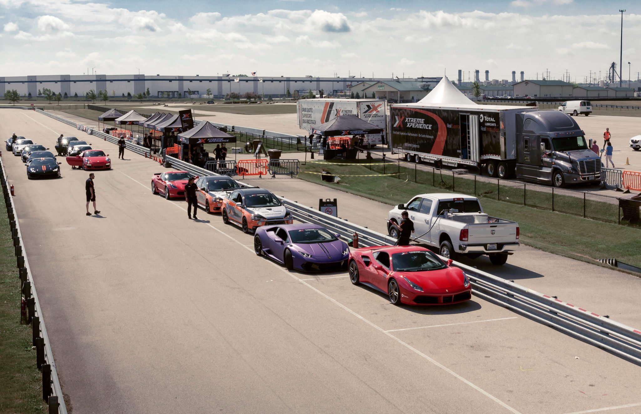 xtreme xperience fleet in pits of autobahn country club event