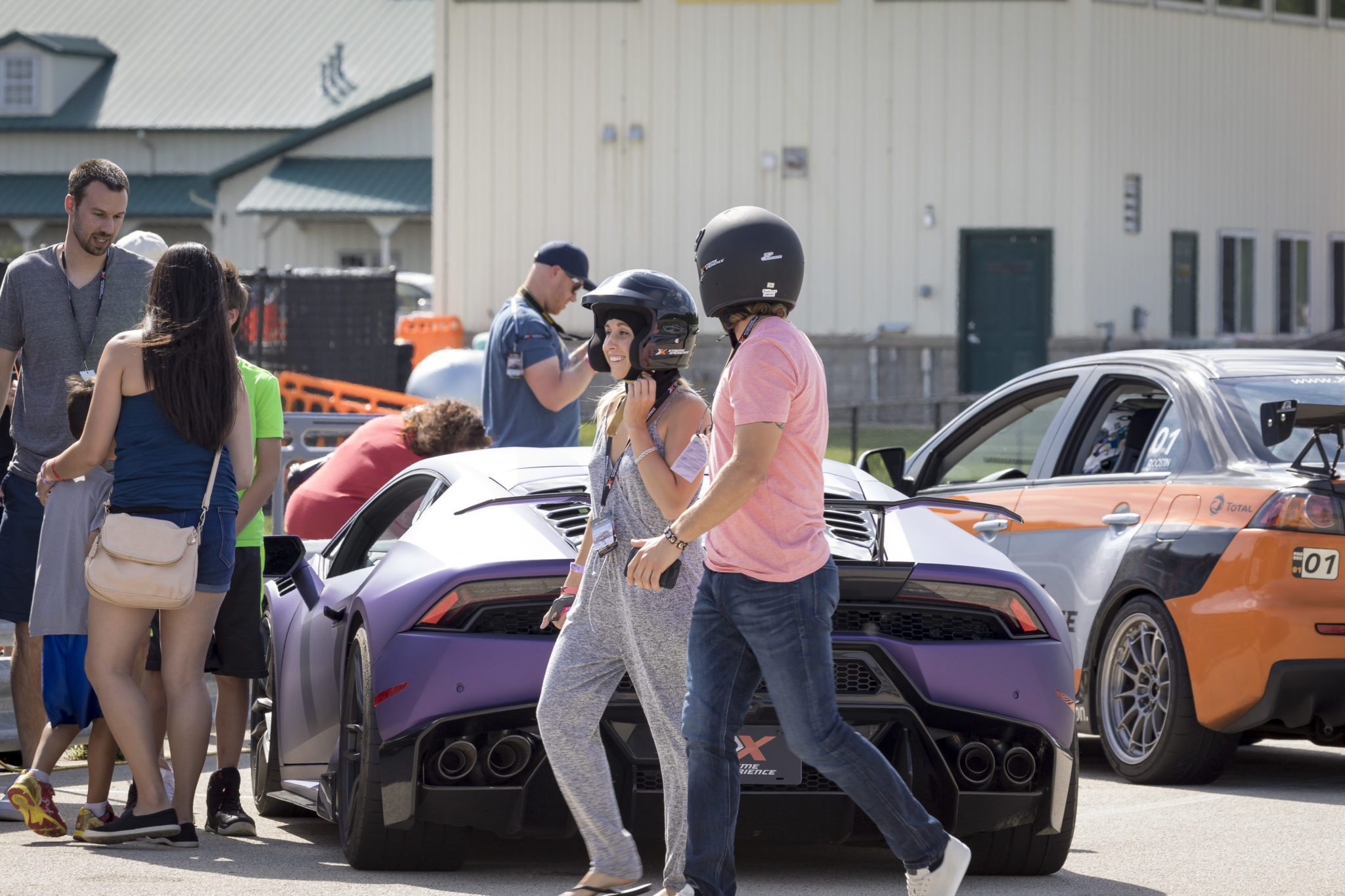 family in pits of xtreme xperience event at autobahn country club