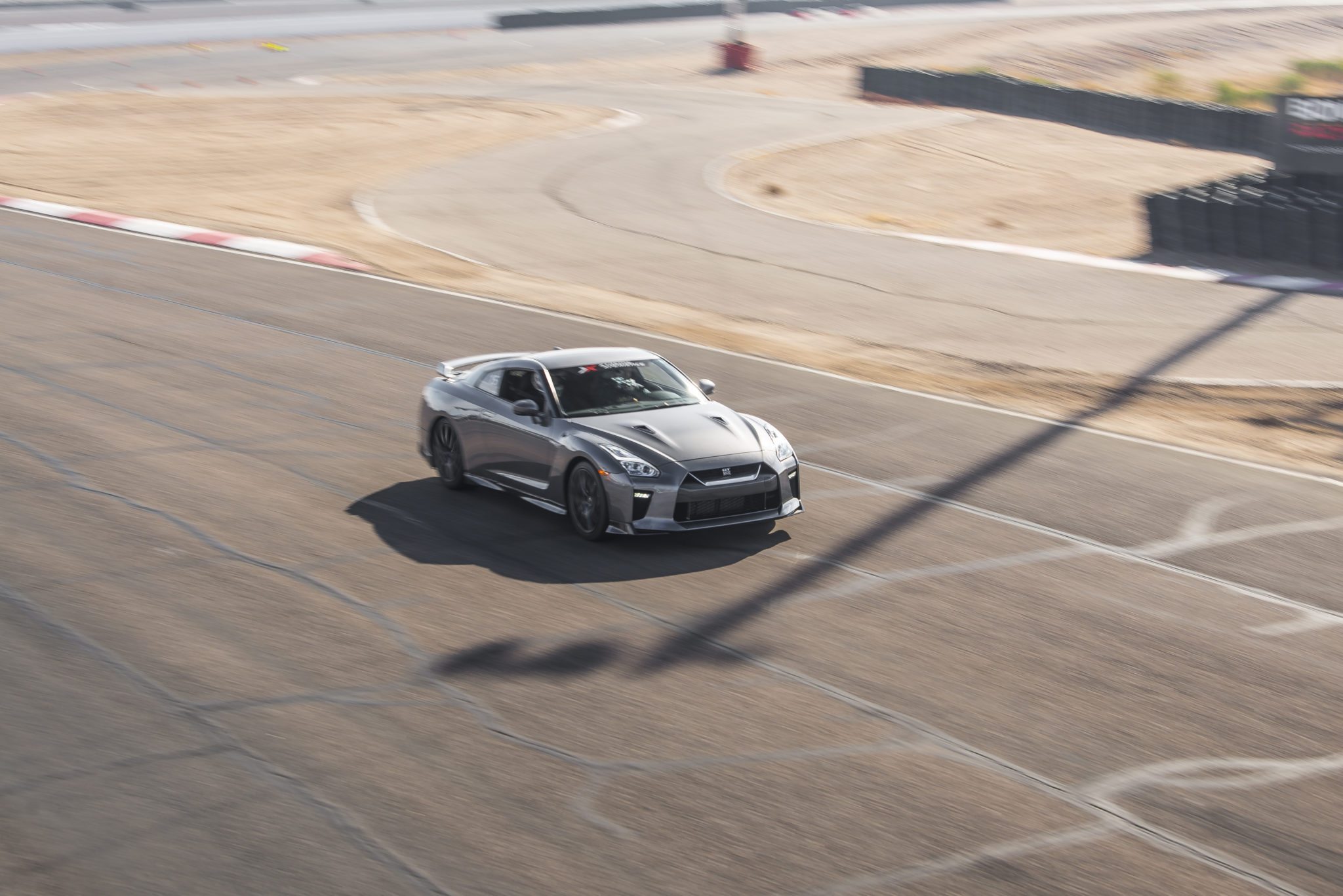 front silver nissan gtr on track