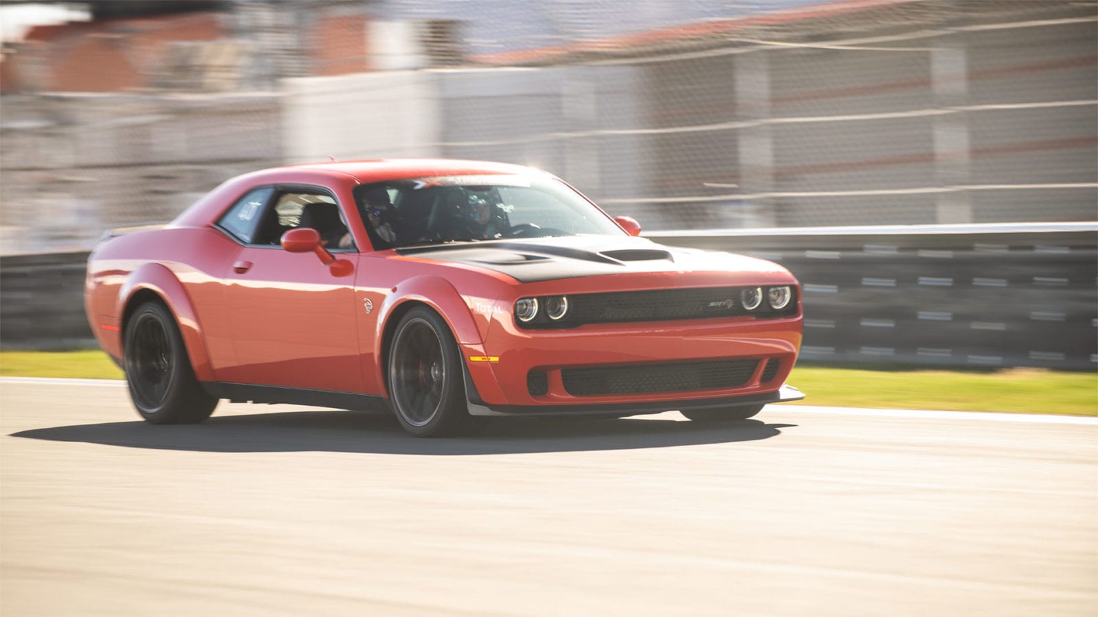 Dodge Hellcat Widebody in red on a racetrack