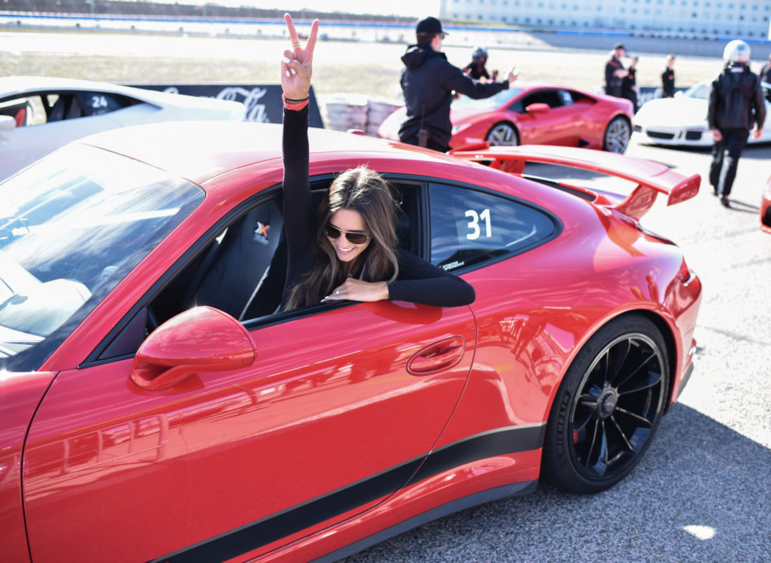 My View In Heels Jaclyn Ram in Red Porsche At Xtreme Xperience
