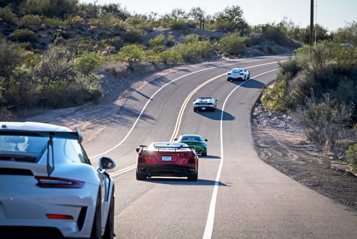 supercars driving backroads through sonoma california